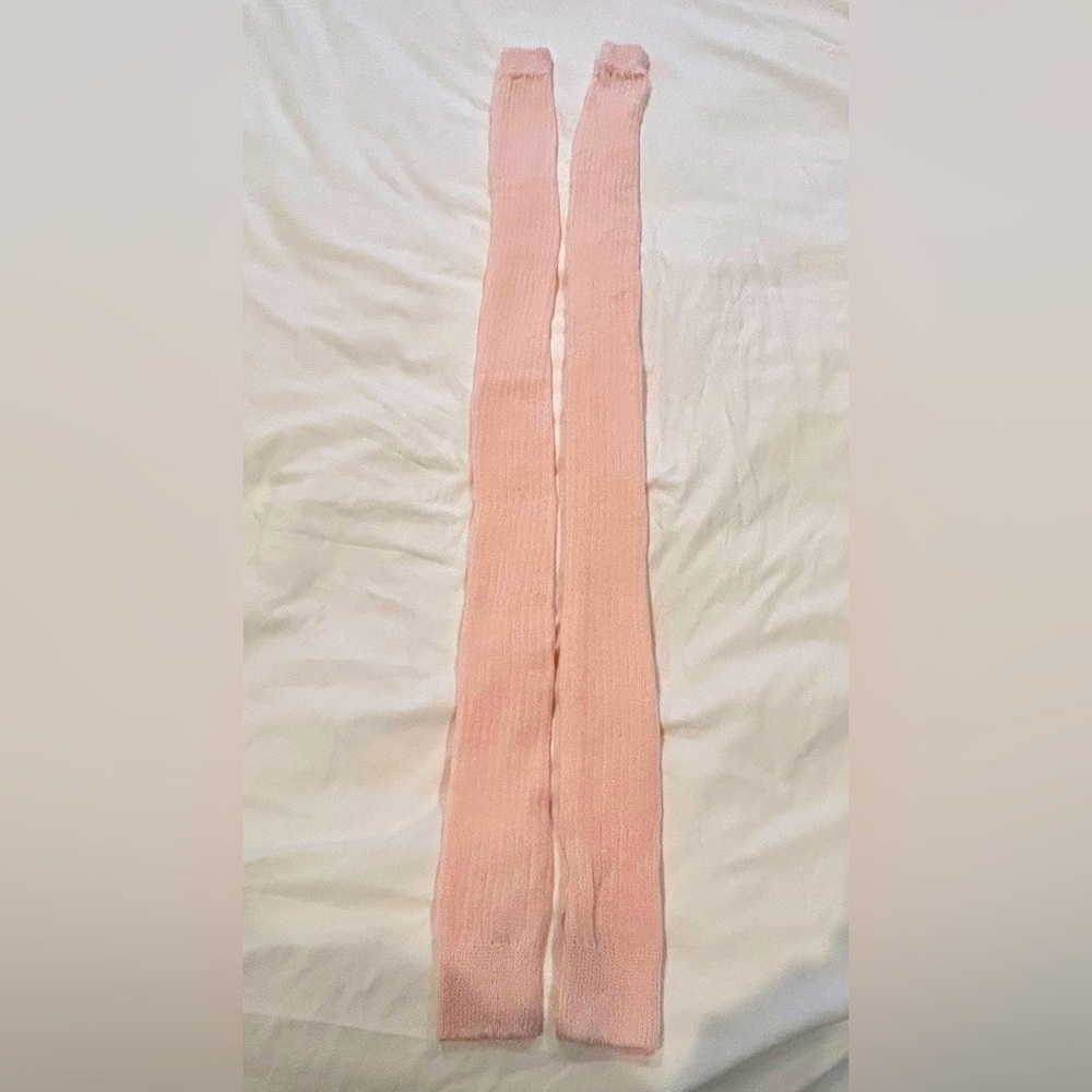 Long powder pink, knit leg warmers for ballet.